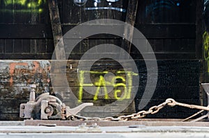 Fast word written with yellow spray paint inside abandoned train car