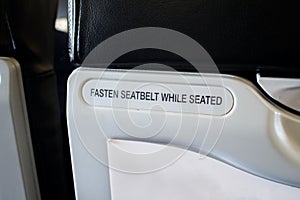 Fasten seat belt sign information on airplane