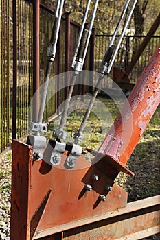 Fasteners, clamps bases for fixing steel cables for suspension bridges and telecommunication towers. close up.Metal construction o