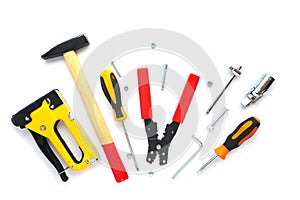 fasteners and repair tools on a white background. flat layout, top view. Space for text.