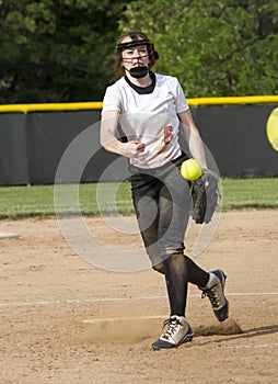 Fastpitch Softball Pitcher In A Game photo