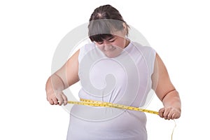 Fat Asian woman wear white t-shirt and checking her body size wi