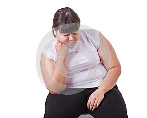 Fat Asian woman wear white t-shirt worried about her body size