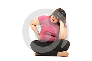 Fat Asian woman wearing gym clothes Sit stressed on a white background.