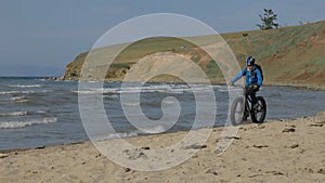 Fat bike also called fatbike or fat-tire bike in summer driving on the beach.