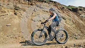 Fat bike also called fatbike or fat-tire bike in summer driving on the road.