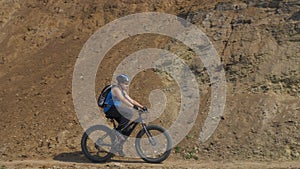 Fat bike also called fatbike or fat-tire bike in summer driving on the road.