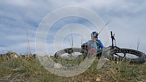 Fat bike or fatbike or fat-tire bike in summer driving through the hills.