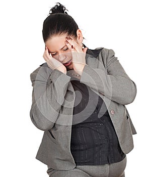 Fat businesswoman suffering from pain, headache