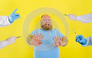 Fat doubter man has doubts about covid-19 vaccine