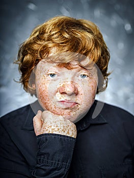 Fat freckled boy portrait
