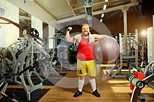 Fat funny man in the gym.