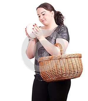 Fat girl with ostriches egg and wicker basket