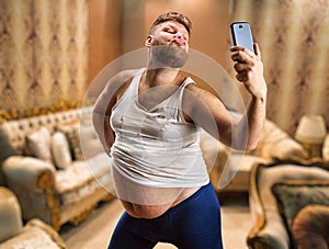 Fat glamour man takes selfie photo