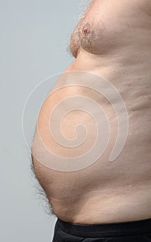 Fat male stomach in profile