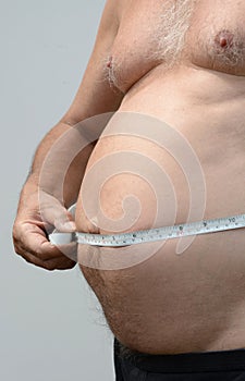 Fat male stomach tape measure