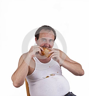 Fat man eating fast food