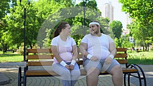 Fat man flirting with obese pretty girl, telling jokes, overcoming insecurities