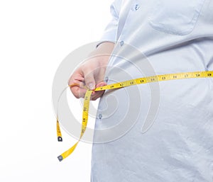 Fat man holding a measurement tape for check out his body isolated on white background.