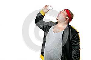 A fat man with pills in hand. Vitamins or Diabet Concept