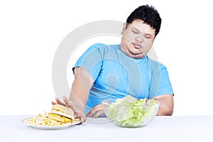 Fat man refuse junk food 1