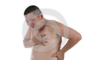 Fat man suffering from heart attack or breathing difficulties