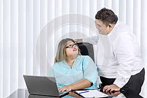 Fat man telling his female employee job to do