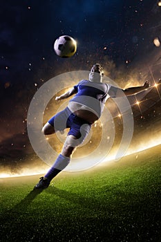 Fat soccer player in action. stadium in fire