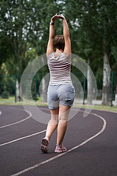 Fat woman with cellulite legs on a morning jog, healthy lifestyle concept