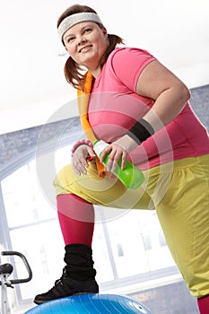 Fat woman in colorful sportswear