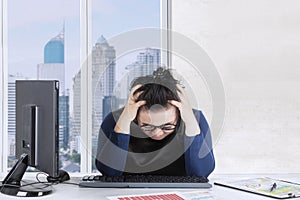 Fat woman feeling dizzy at office