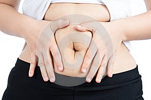 Fat woman holding excessive fat belly, overweight fatty belly isolated on over white background. Diet lifestyle, weight loss,