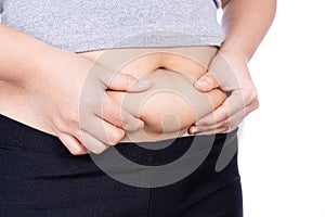 Fat woman holding excessive fat belly, overweight fatty belly isolated on over white background. Diet lifestyle, weight loss,