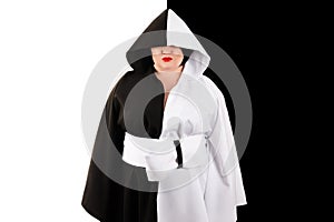 Fat woman with hood in beautiful black and white dress on black and white background