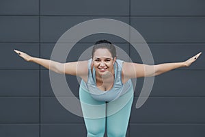 Fat woman jogging, doing sports for weight loss, obesity problem.