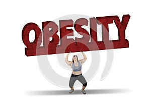 Fat woman lifting obesity word