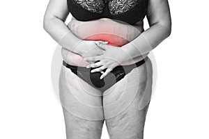 Fat woman with menstrual pain, endometriosis or cystitis, stomach ache, overweight female body isolated on white background