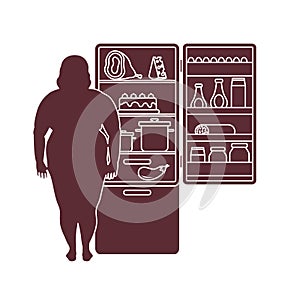 Fat woman stands at the fridge full of food. Harmful eating habits.