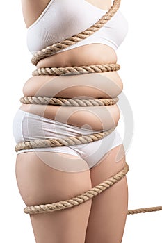 Fat woman in white underwear twisted with a rope.