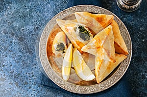 Fatayer sabanekh - traditional arabic spinach triangle hand pies