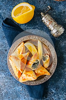Fatayer sabanekh - traditional arabic spinach triangle hand pies