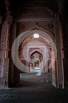 FATEHPUR SIKRI A stone arch of red sandstone leads out of the Emperor`