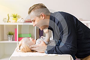 Father adoring his beautiful baby daughter