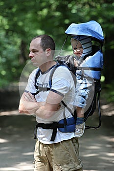 Father with baby in carrier