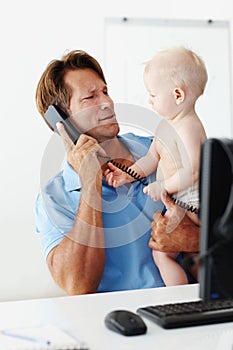 Father, baby and phone call for remote work in home with multitasking, connectivity and communication. Man, young male