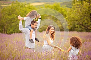 Father carrying his son shoulders.  Fun and summer