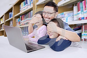 Father censoring internet contents from the kids photo