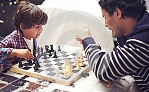 Father, child and chess board game for competition challenge for planning strategy with pawn, knight or queen. Man, son