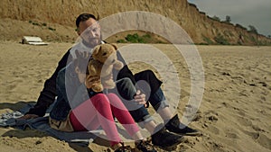 Father child enjoy beach nature. Young family playing toy on sea shore sand.