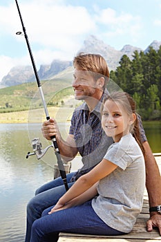 Father, child and fishing in nature for teaching, learning and outdoor with holiday, travel or sustainable living in